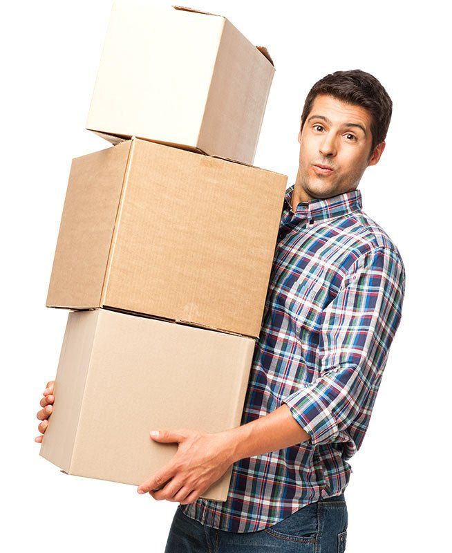 man holding various sized boxes