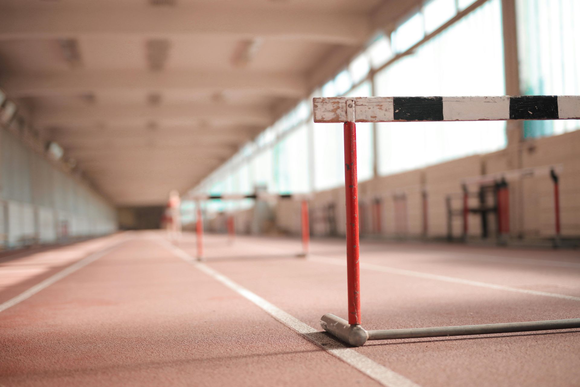 Hurdles on an indoor race track