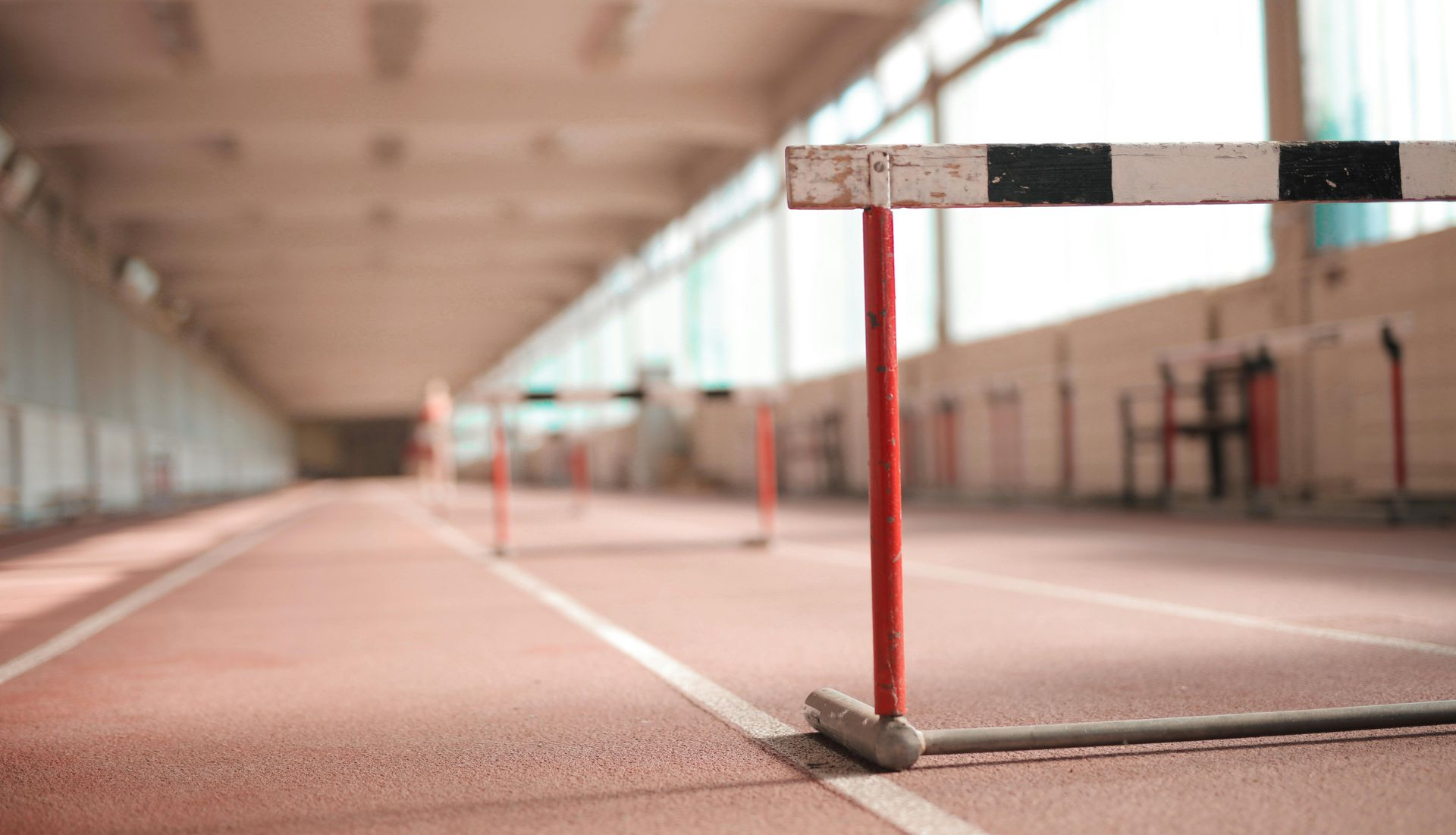 Hurdles on an indoor race track