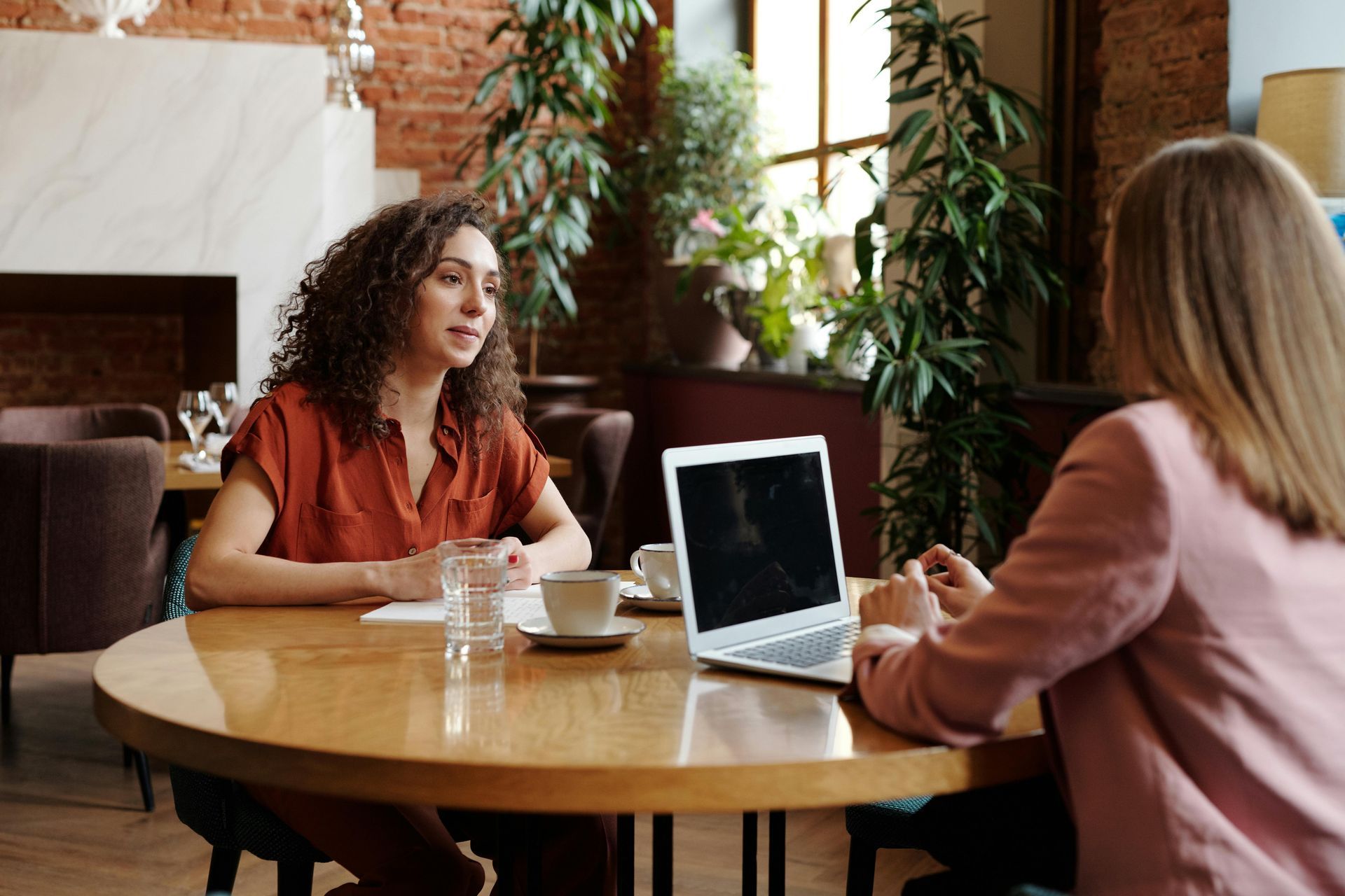 Business Meeting between two women.