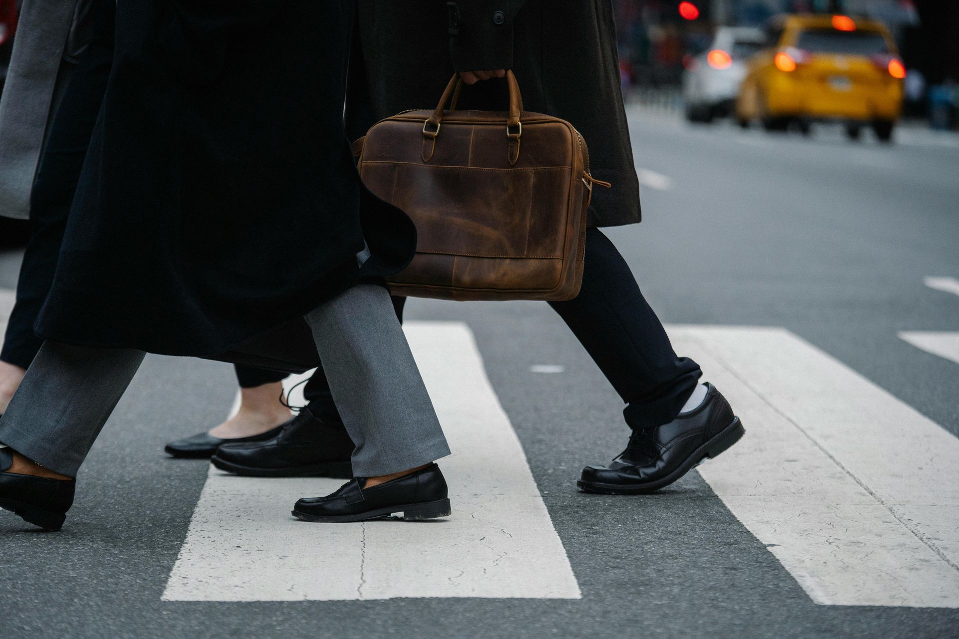 Business people crossing the road in the CBD