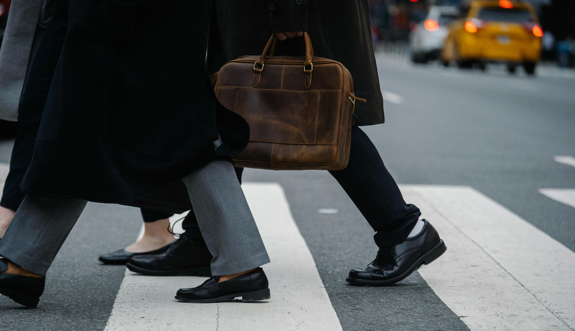 Business people crossing the road in the CBD