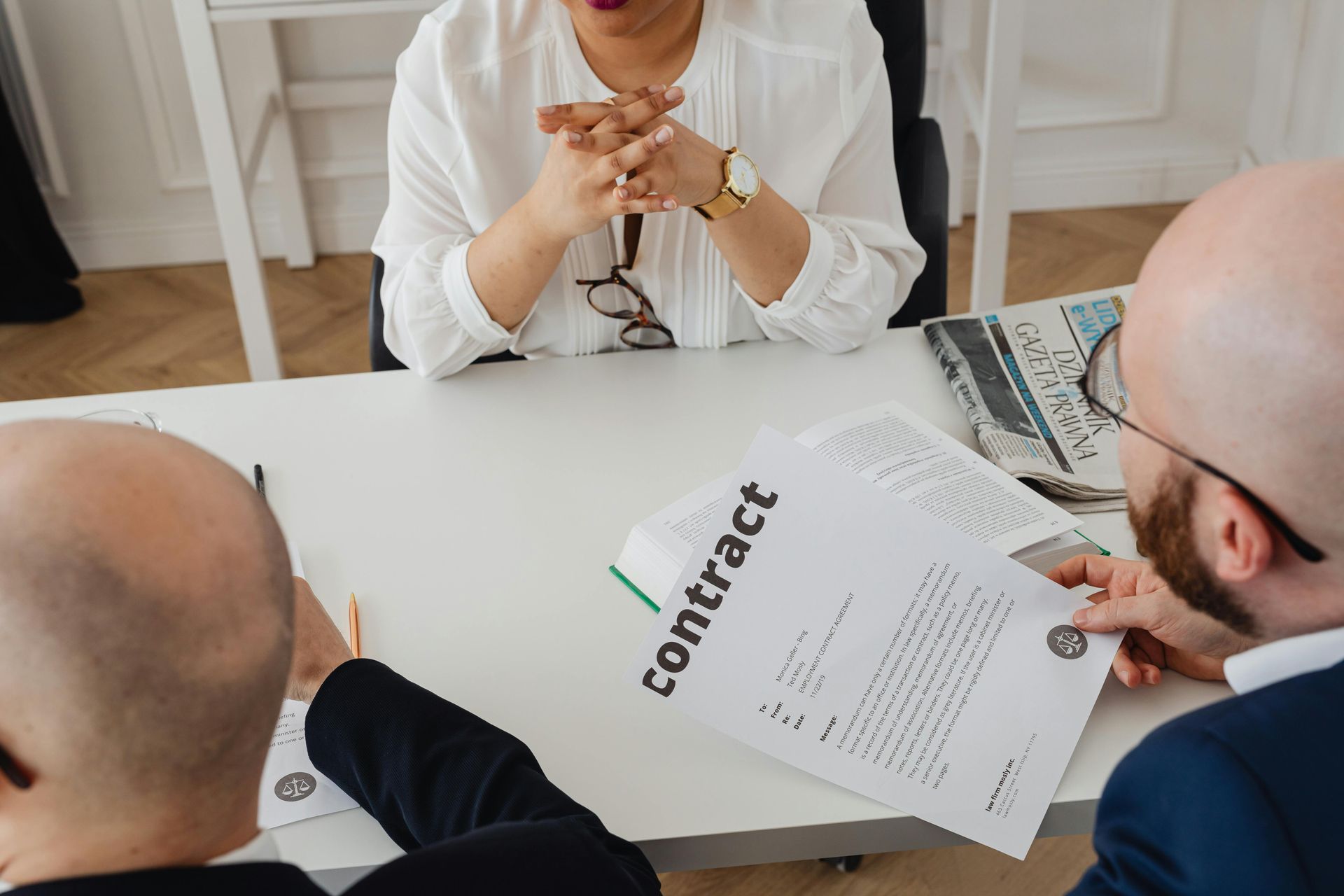 People discussing a contract