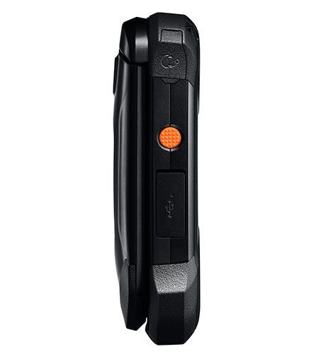 A black flip phone with an orange button on the side