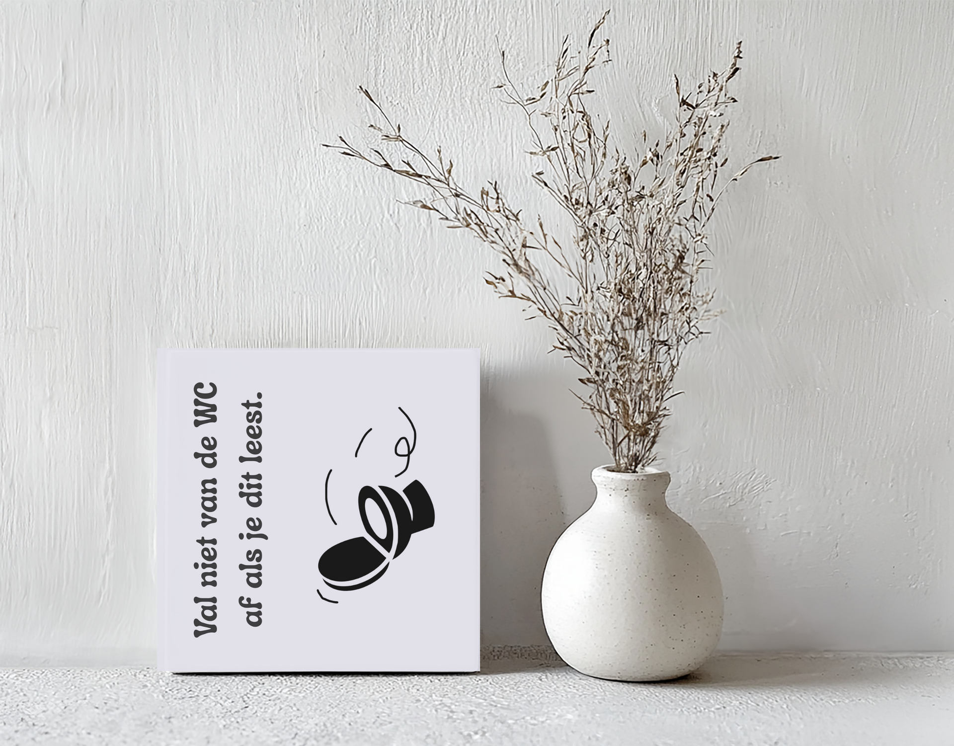 Tegeltje val niet van de wc steen