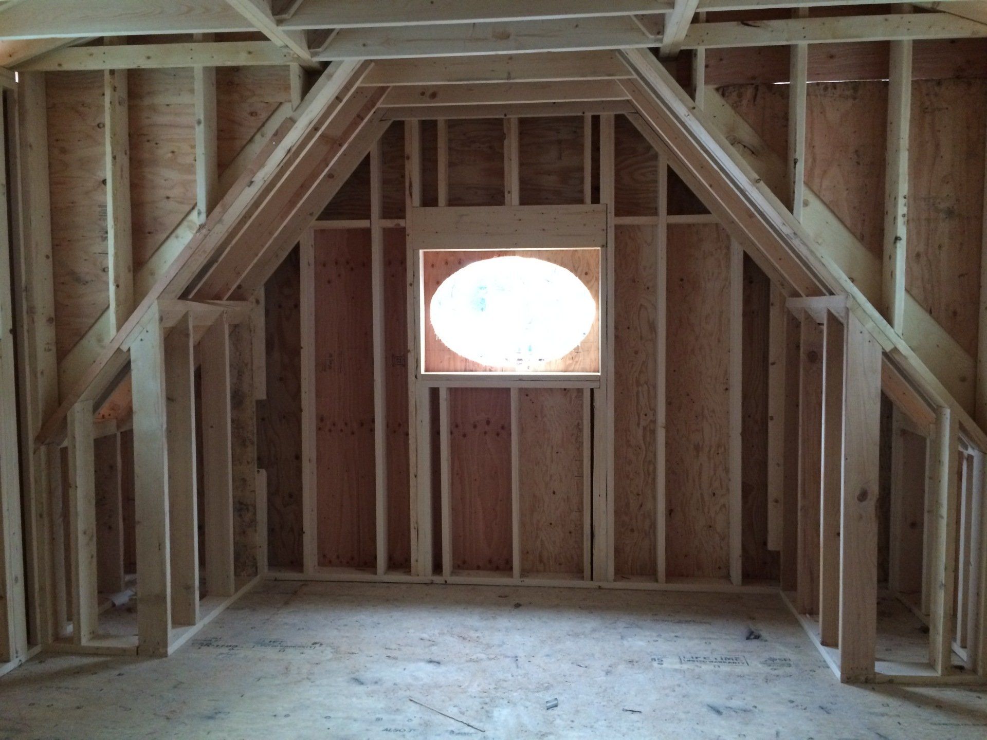 A room with a window in the middle of it