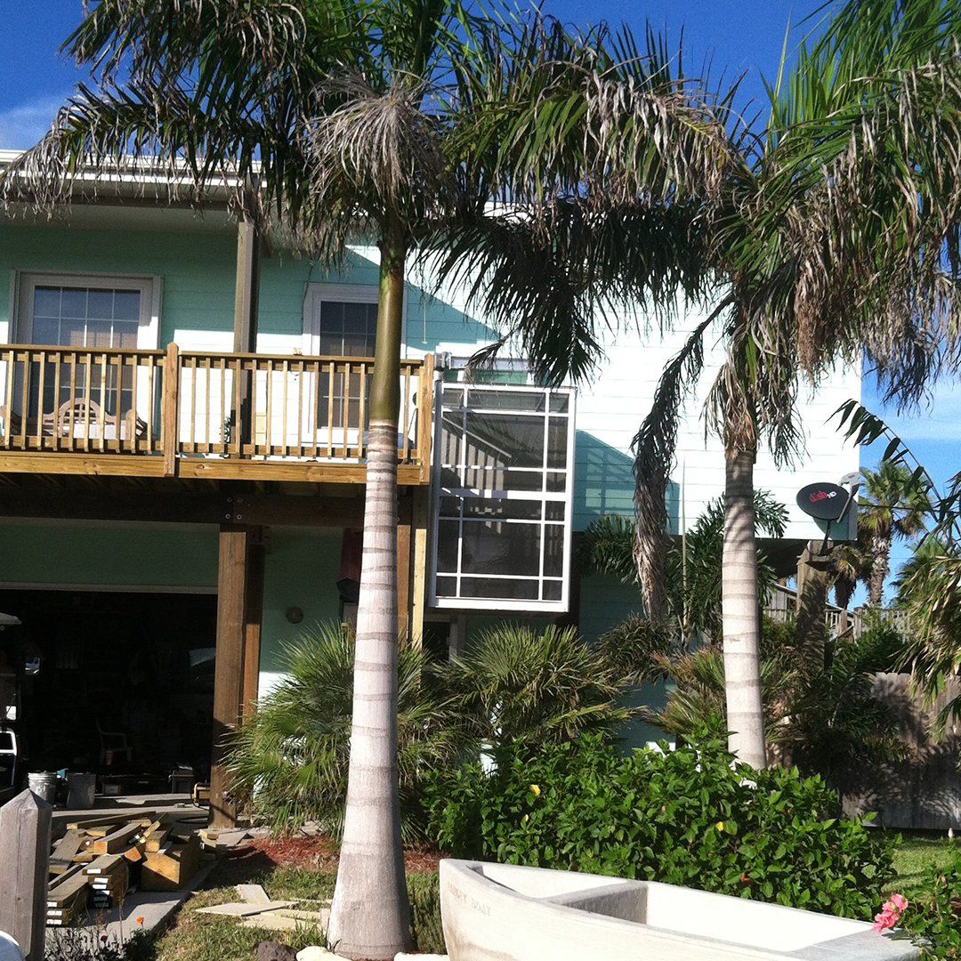 Enclosed Passenger Lift installed on a beach house