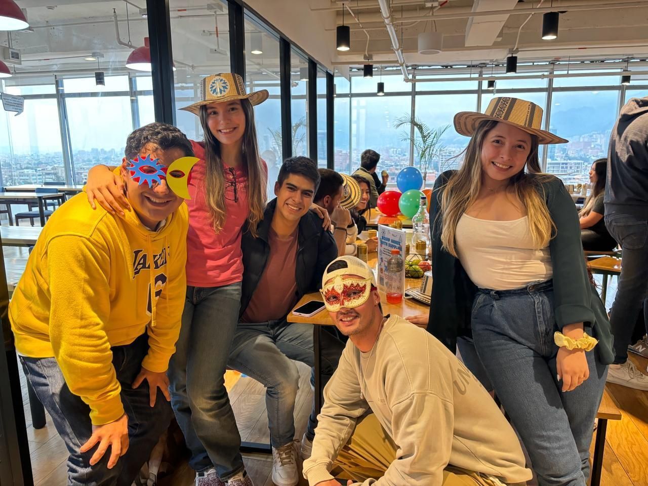 Cheers! Fun at the Bogota office with fellow team members.