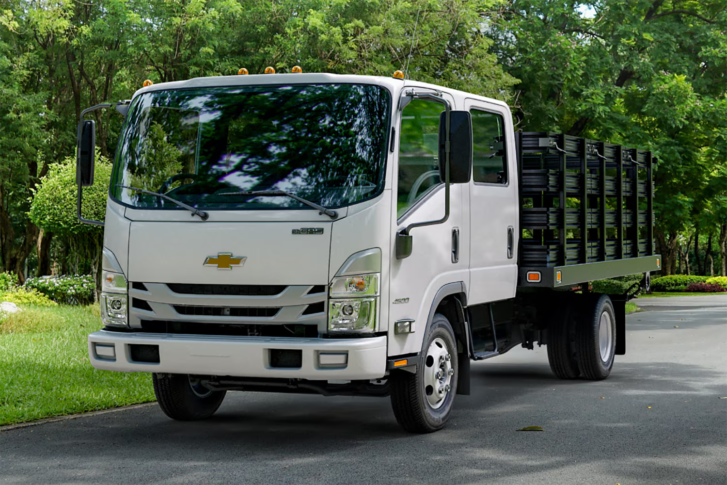 Commercial truck driving down the road in the Miami suburbs. 