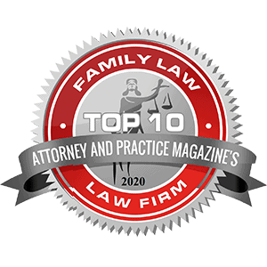 Attorney and Practice Magazine's Top 10 Family Law Firm award badge in red, silver, and black, 2020