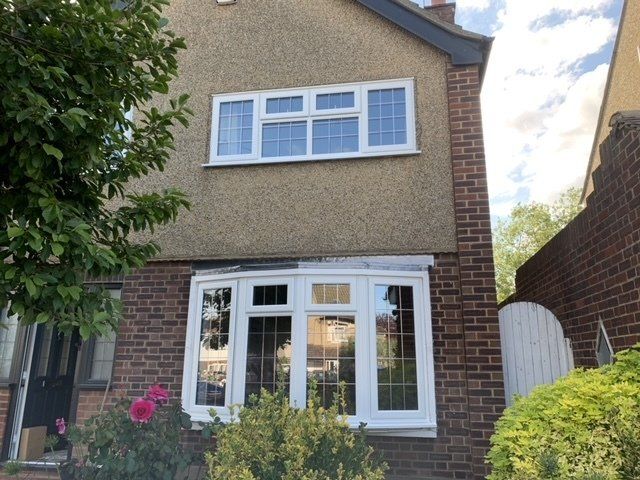 Tri-fold doors with brown frame