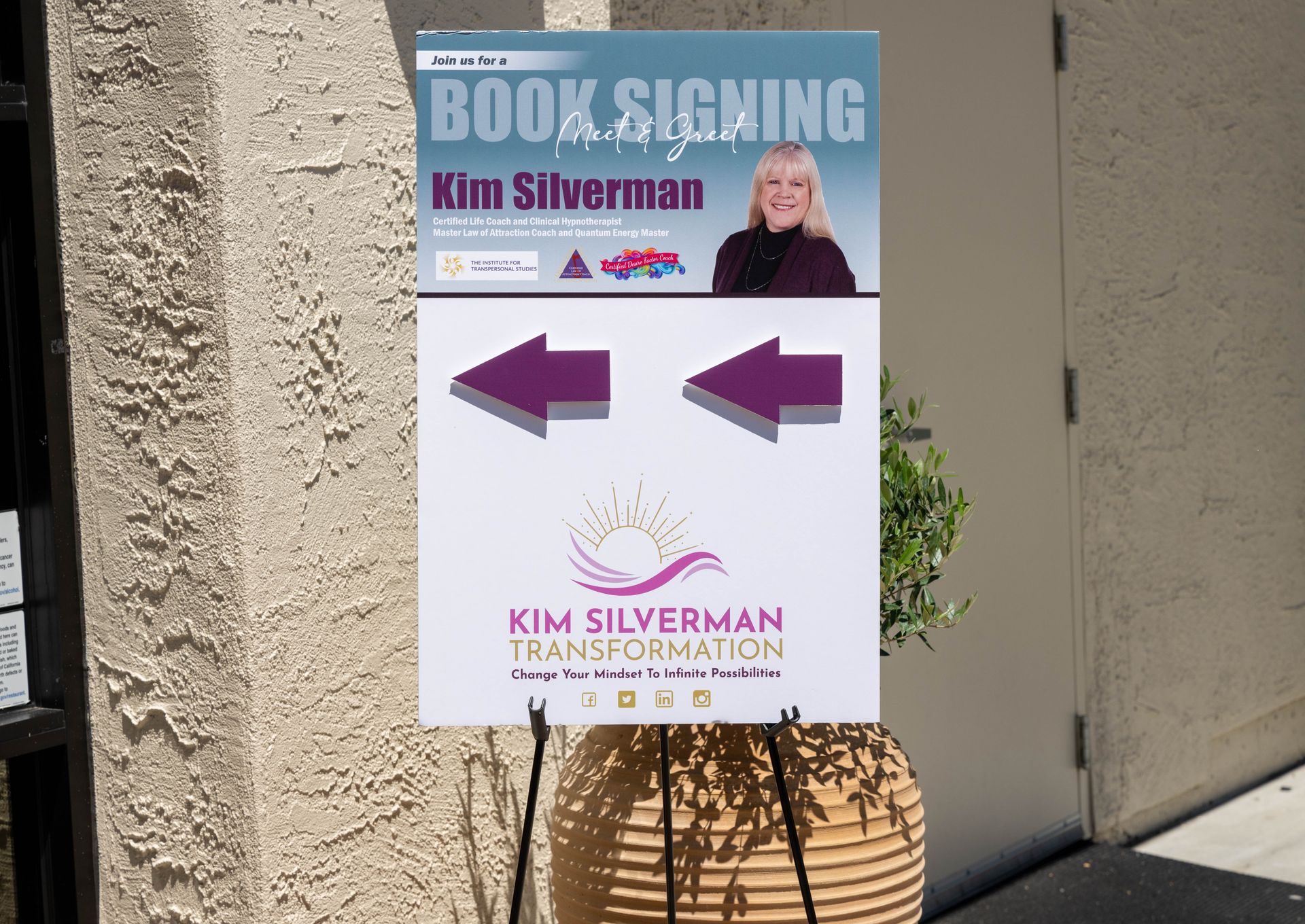 A sign that says book signing Kim Silverman.