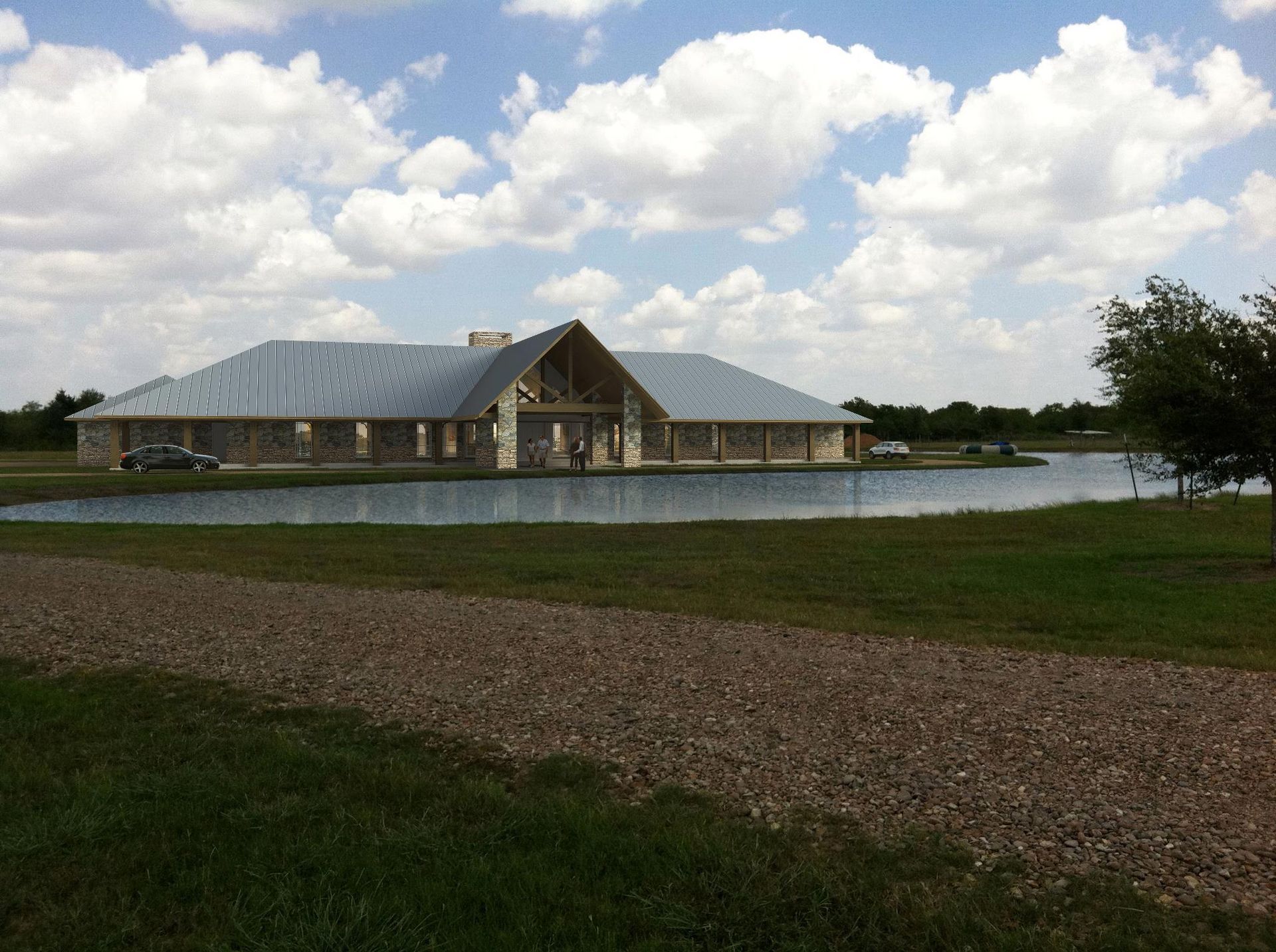 A house with a large pond in front of it.