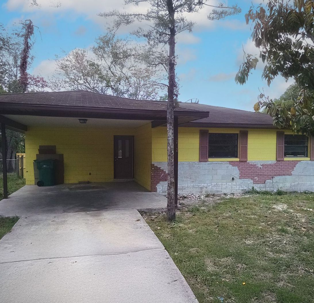 Photo of a distressed property we purchased, rehabbed, and sold as a fix and flip.