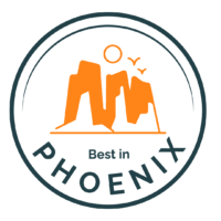 A phoenix logo with a mountain and birds in a circle