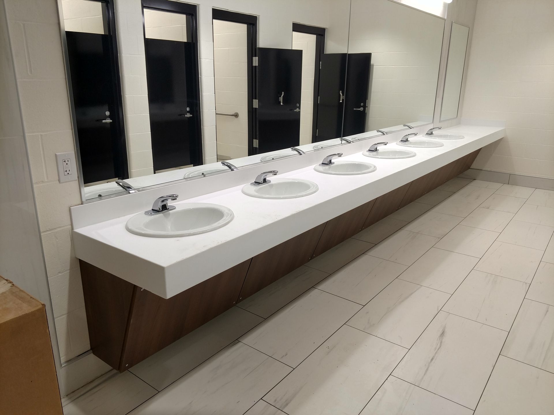 Commercial Casework Modern Bathroom Sink Counter Solid Surface Cabinet Hutchison Brothers Cabinetry Russellville AR