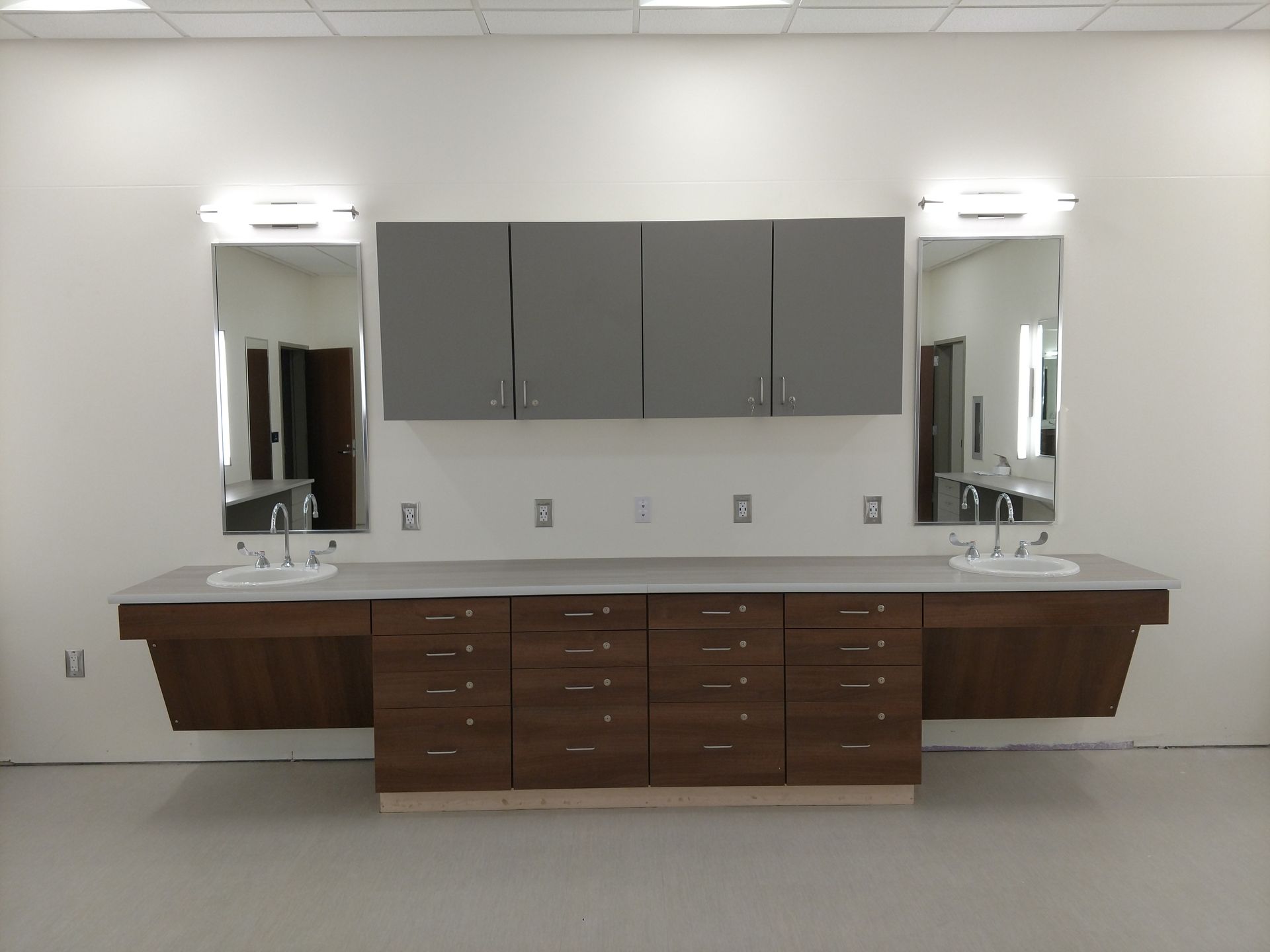 Commercial Casework Modern Bathroom Counter Solid Surface Cabinet Hutchison Brothers Cabinetry Russellville AR