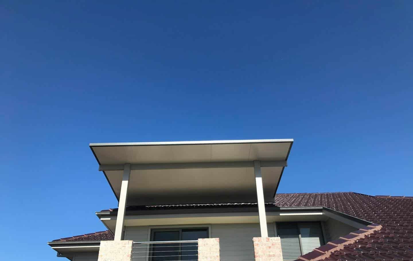 A House With A Sign That Says Caprice On It — Caprice Home Additions In Taree, NSW