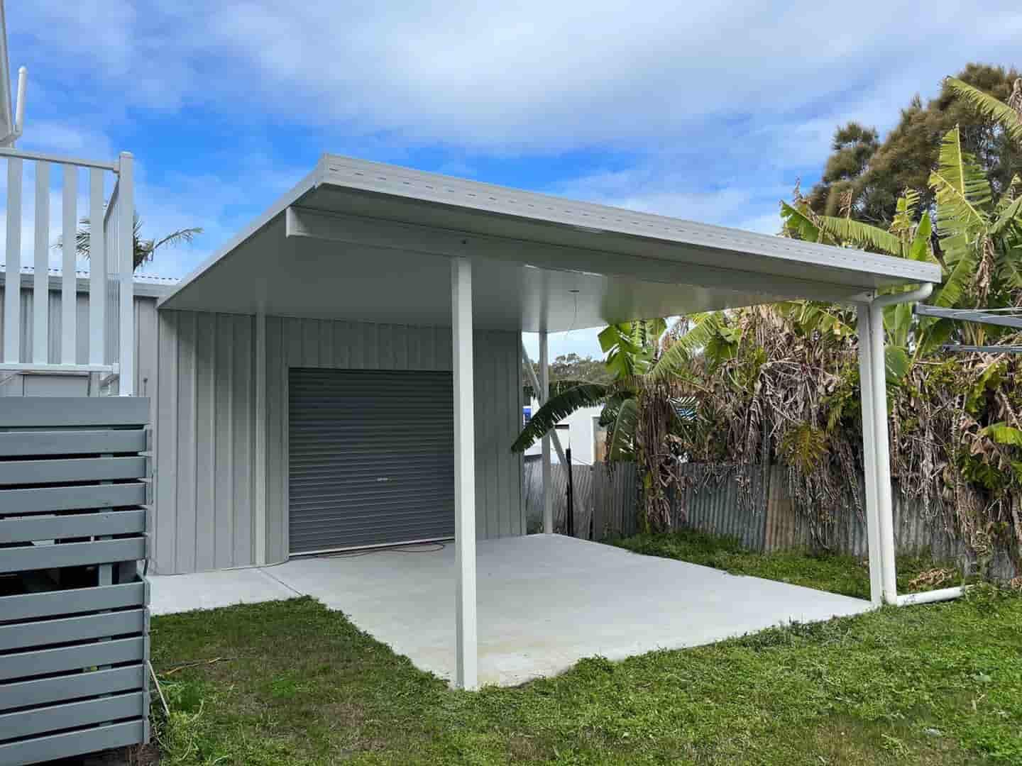 There Is A Carport In The Backyard Of A House — Caprice Home Additions In Tuncurry, NSW