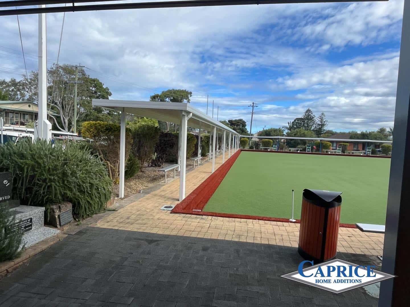 A View Of A Bowling Alley From The Inside Of A Building — Caprice Home Additions In Taree, NSW