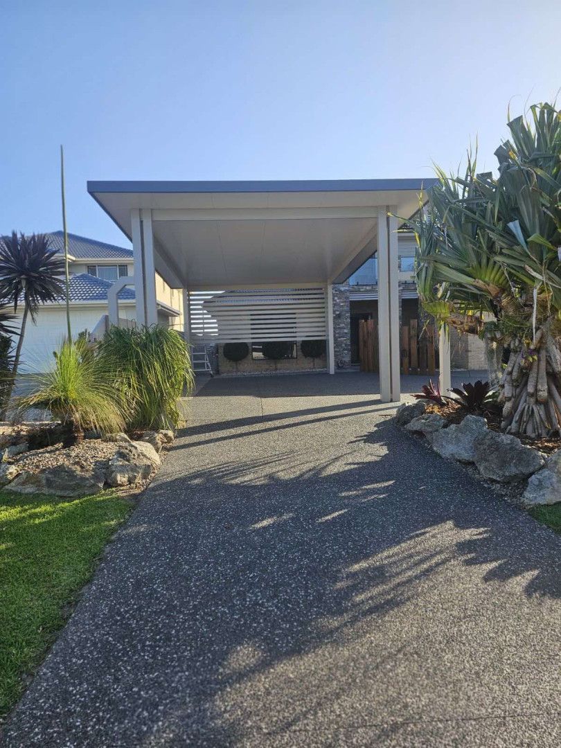 A Driveway In Front Of A Building With A Canopy — Caprice Home Additions In Taree, NSW