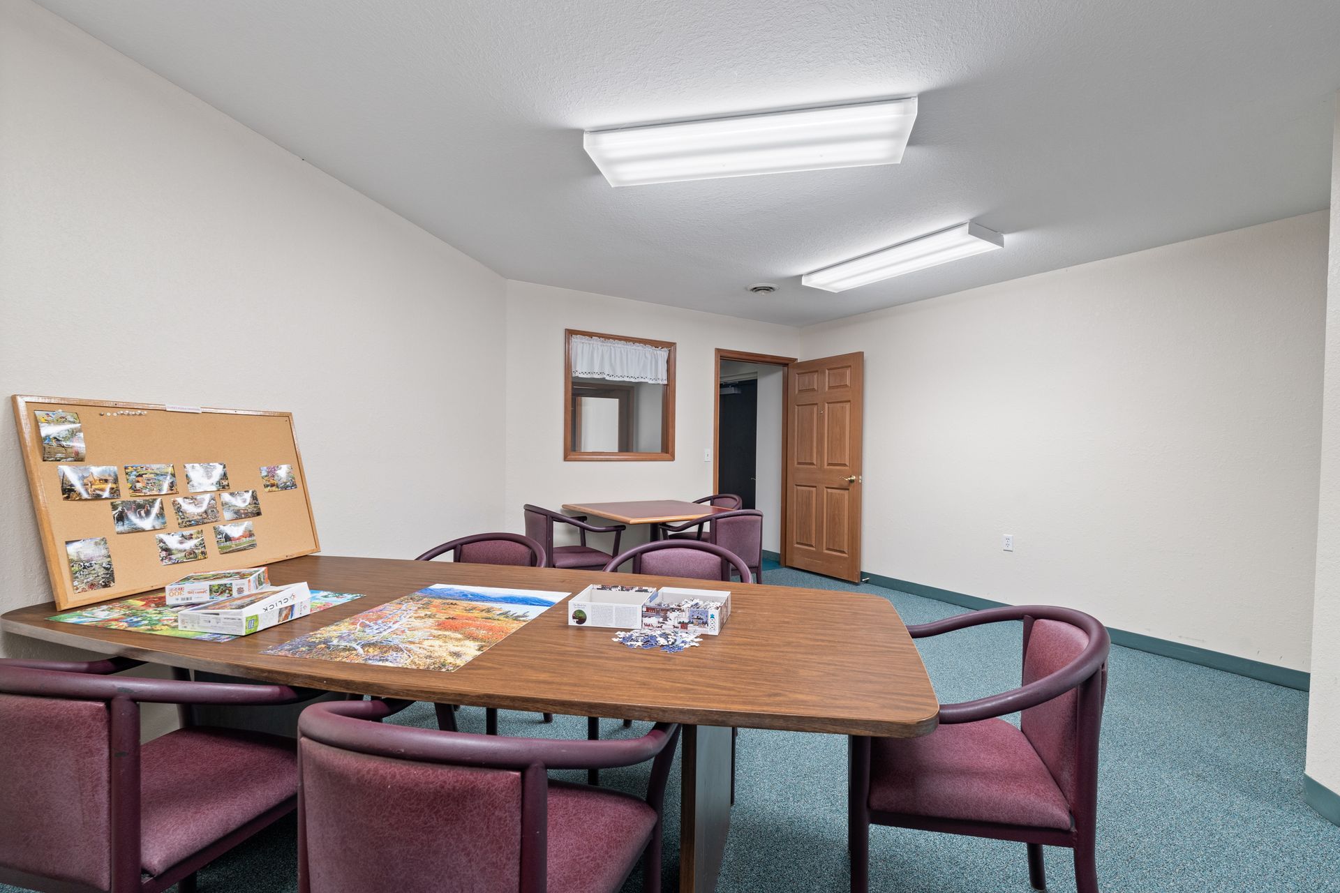 Photo of a table for crafting, with a project in progress on it