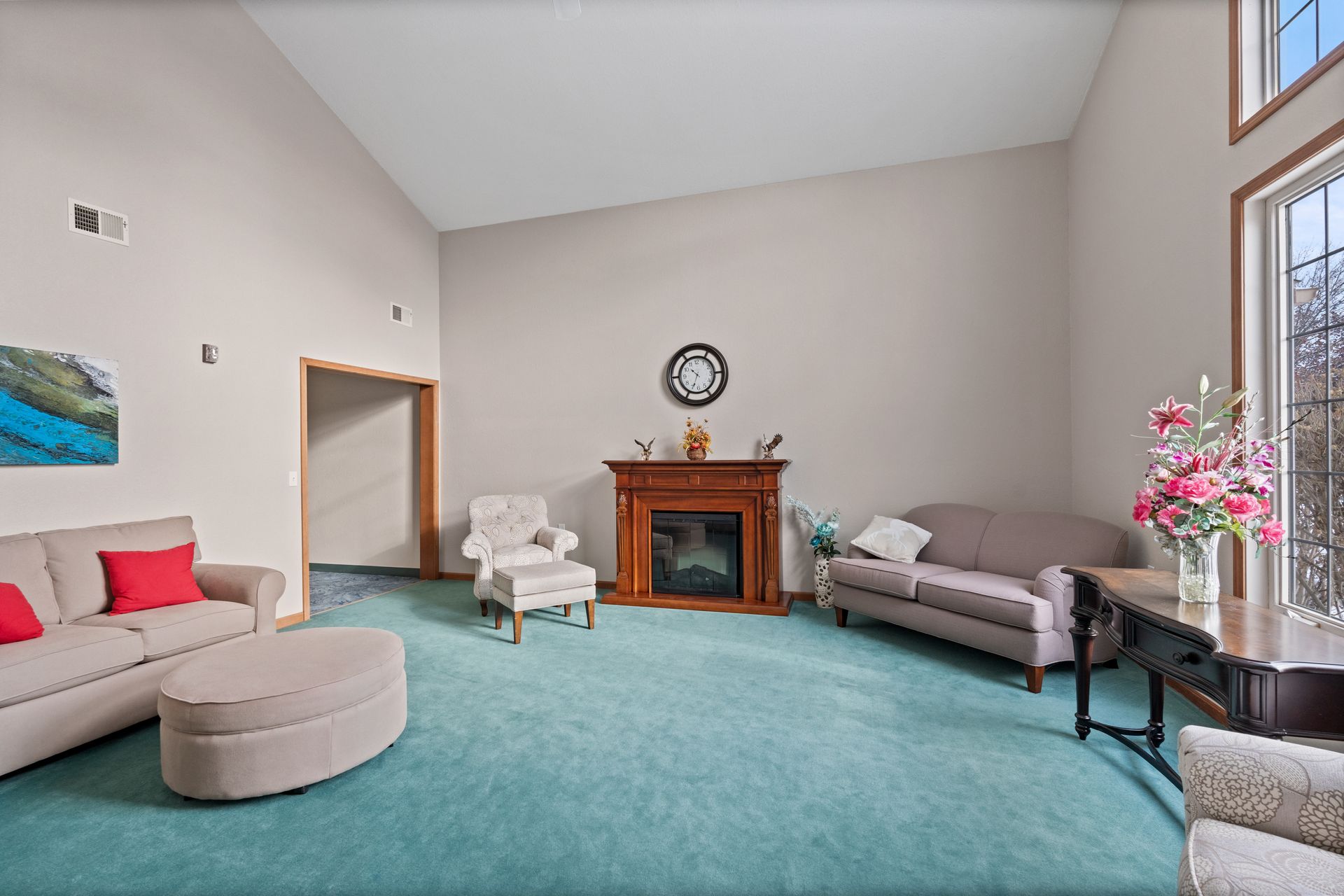 Photo of a parlor with plenty of natural light