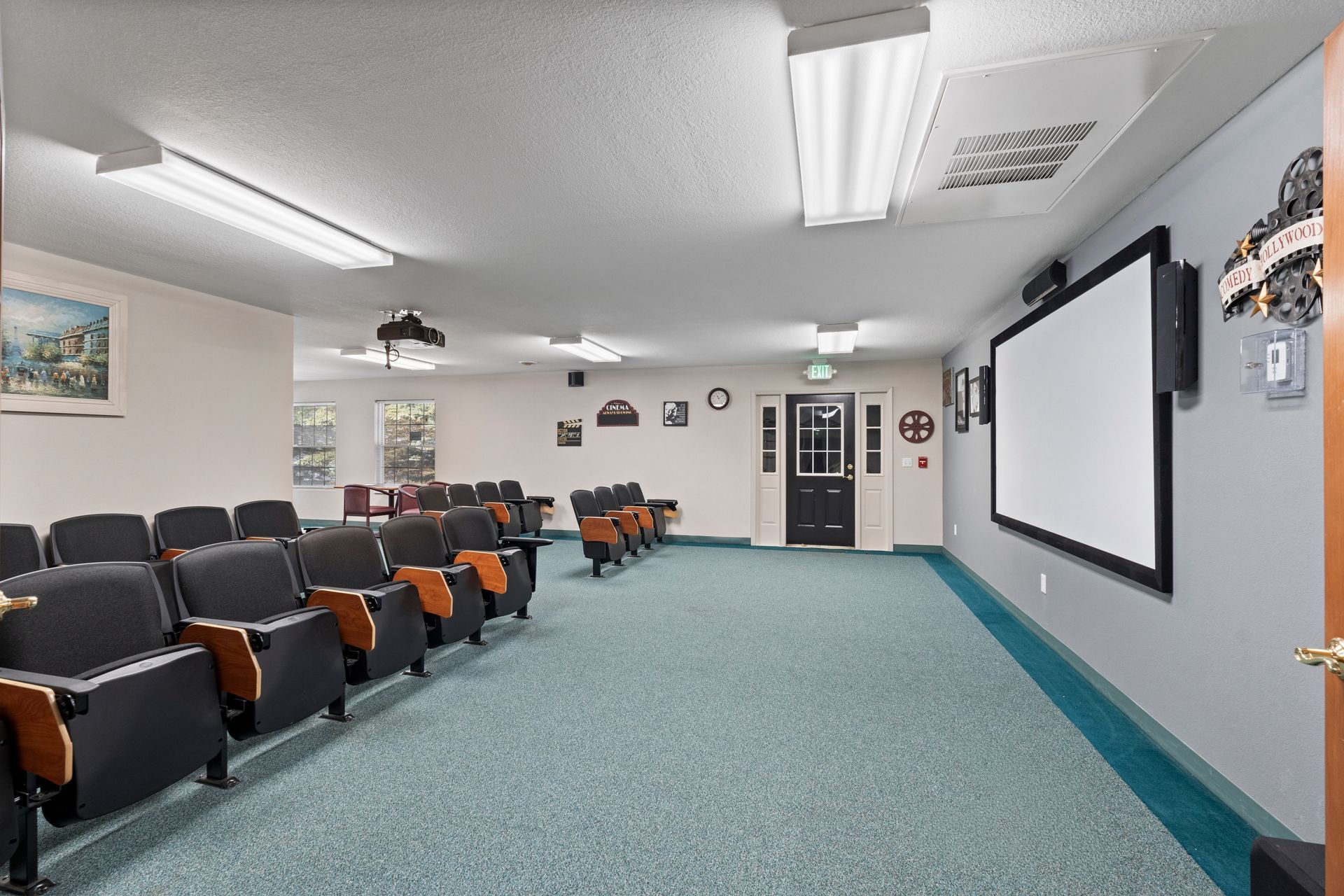 Photo of the theater, showing a couple of rows of seating