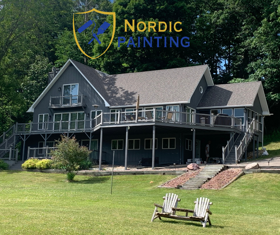 A large house with two chairs in front of it and a sign that says nordic painting