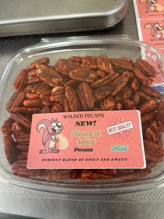 Container of sweet & spicy pecans, labeled