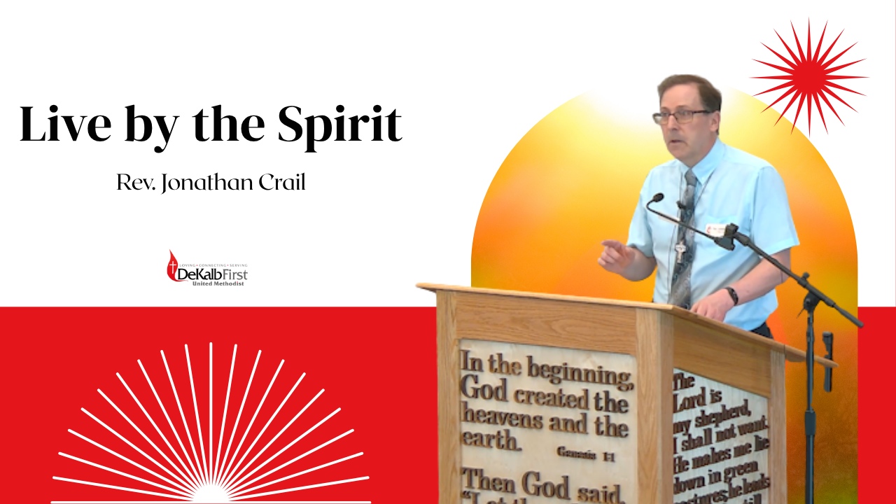 A pastor is standing at a podium giving a speech titled live by the spirit