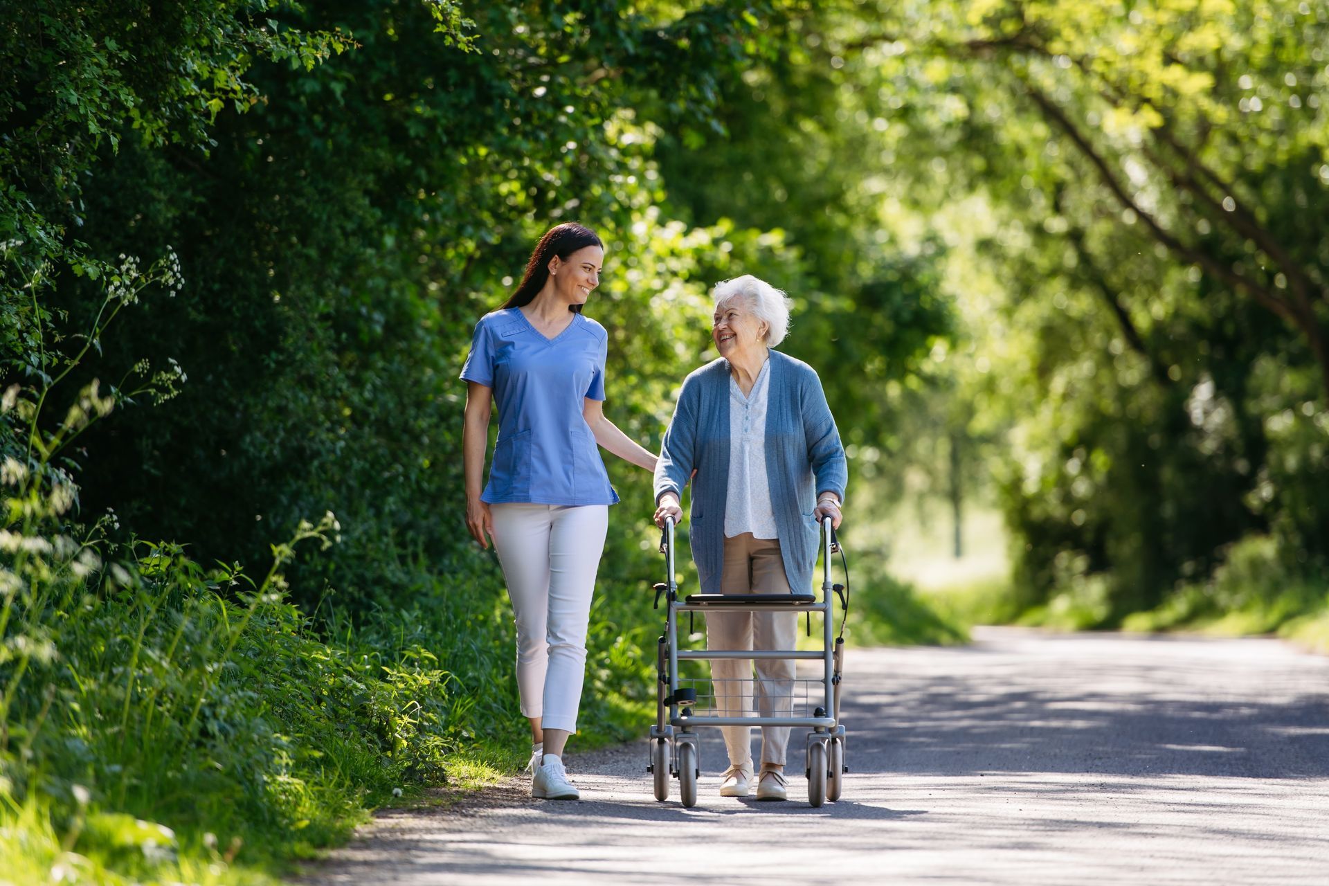 A caregiver helps a senior