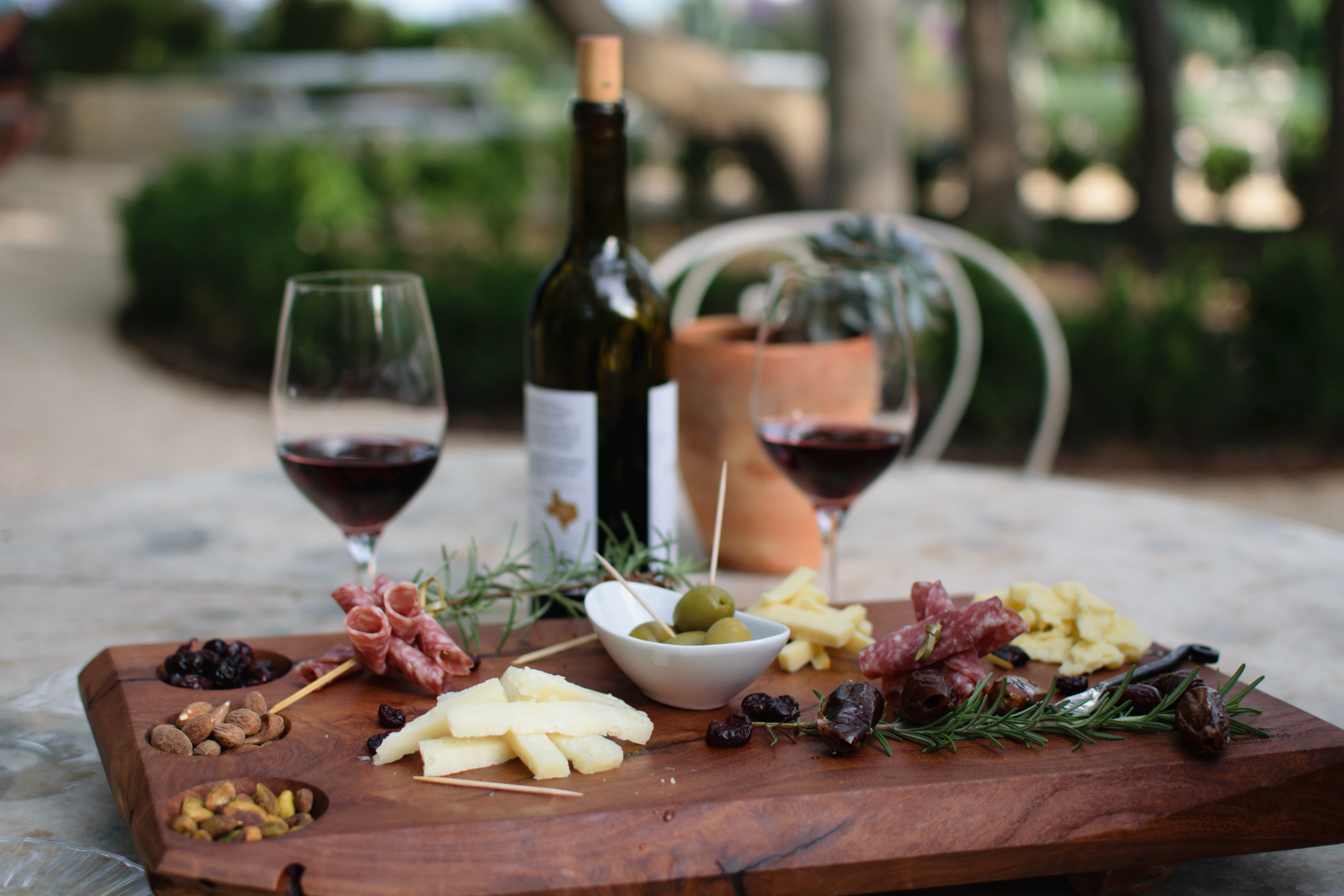 Wine and cheese platter with red wine in Nemea region