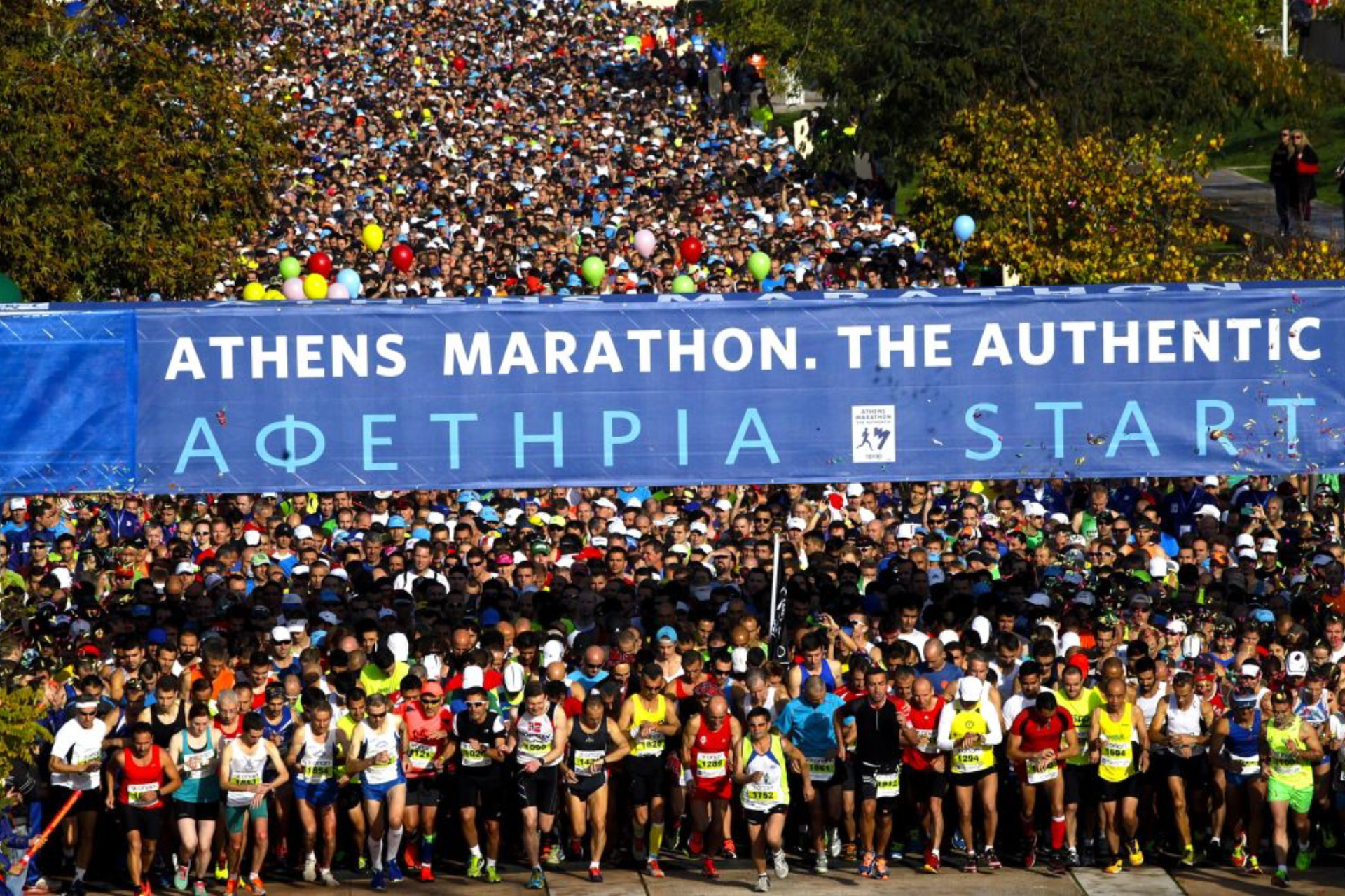 Athens Authentic Marathon starting line with runners at Marathon Greece.