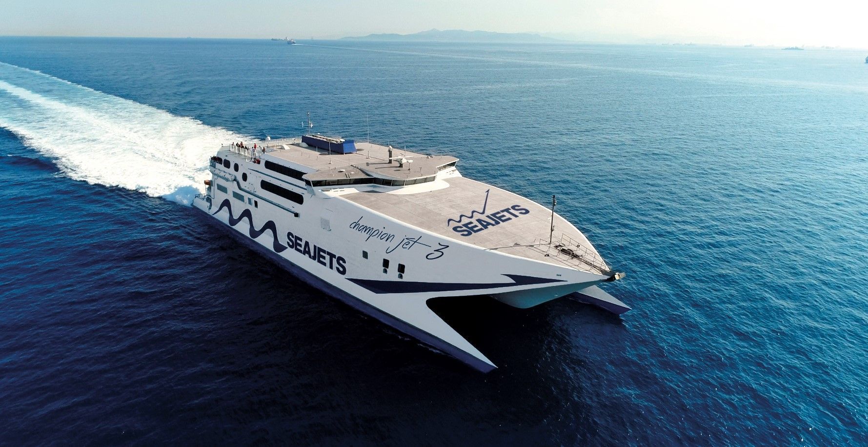 High-speed ferry sailing across the Aegean Sea symbolizing Greek island ferry routes with Athenaos.