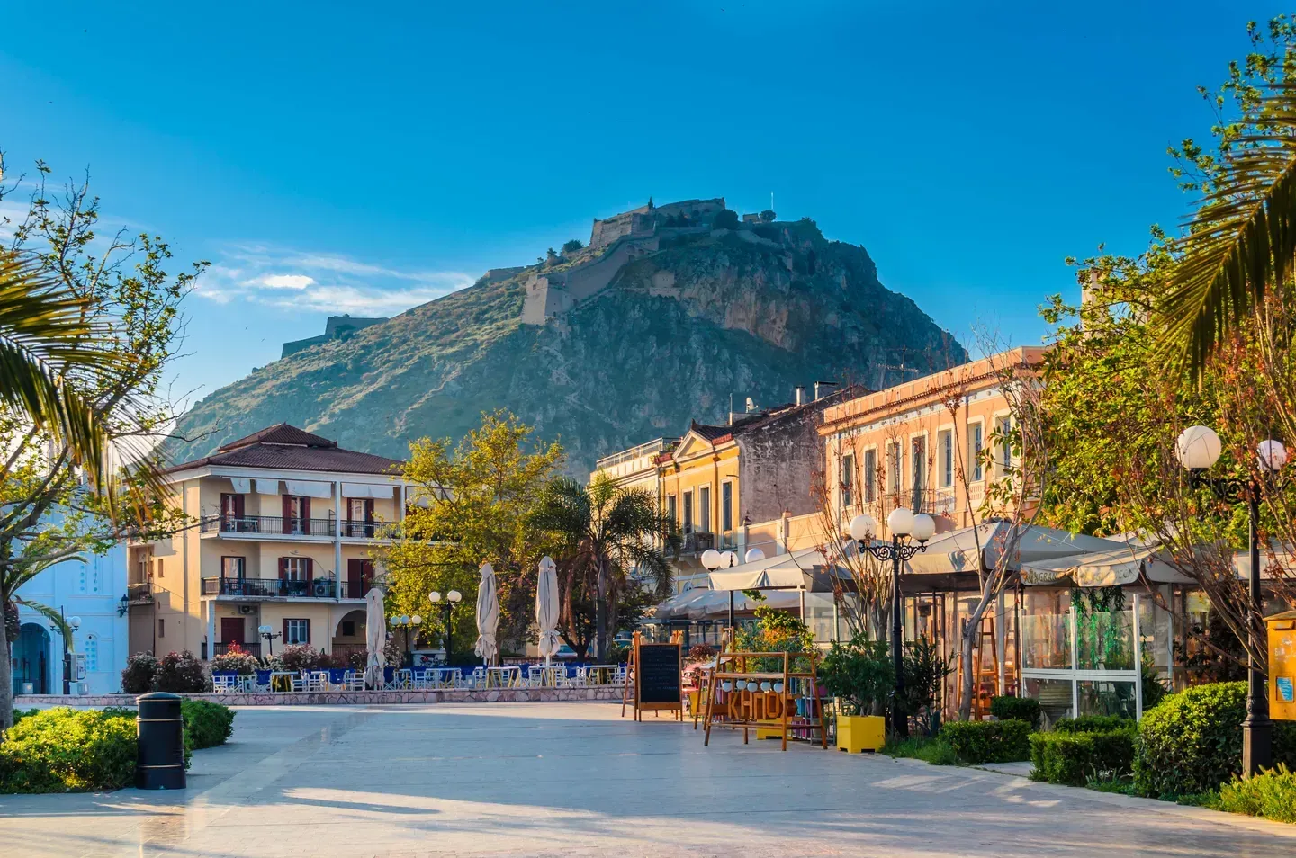 Central square of Nafplio with Palamidi Fortress in the background