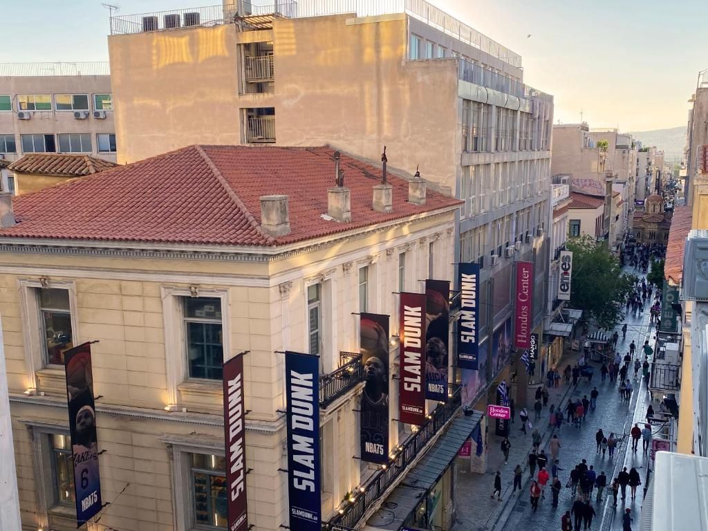 Ermou Street shopping area in central Athens at sunset