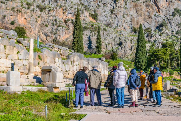 Guided group visiting the archaeological site of Delphi