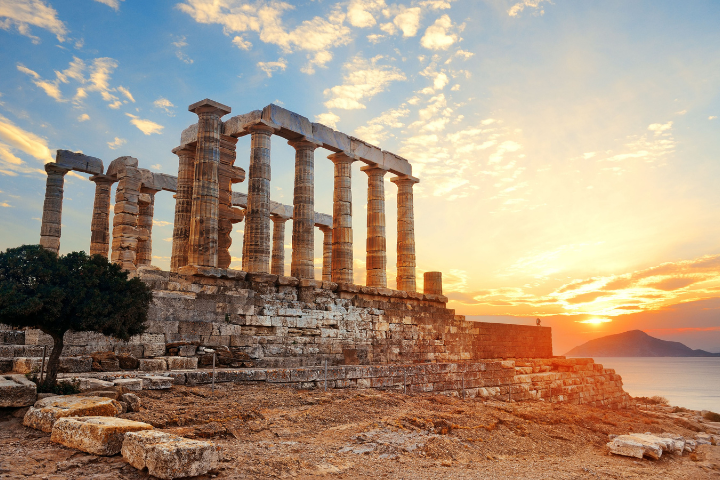 Temple of Poseidon at Cape Sounion during sunset