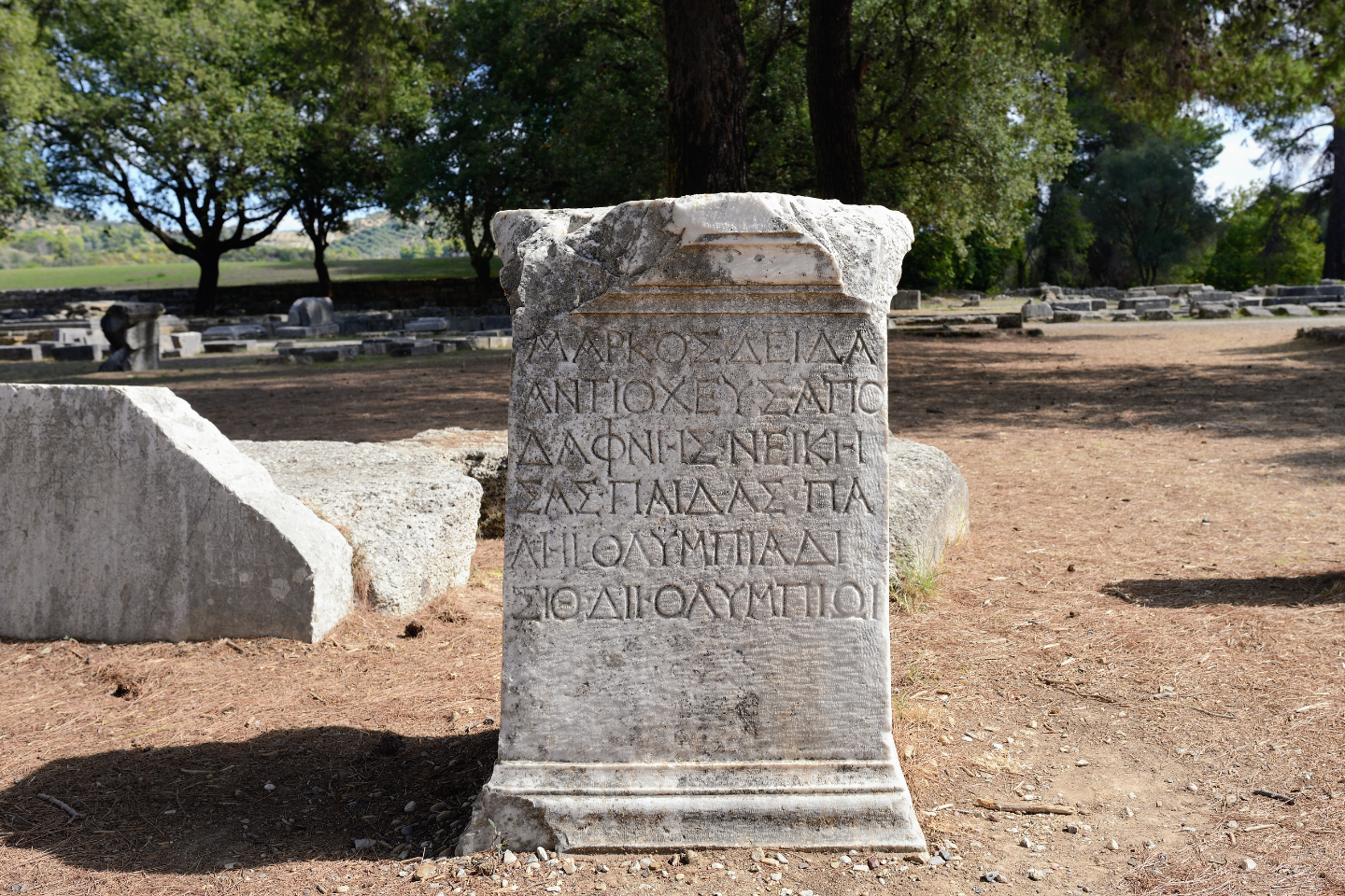 Ancient Greek stone inscription at the archaeological site of Olympia