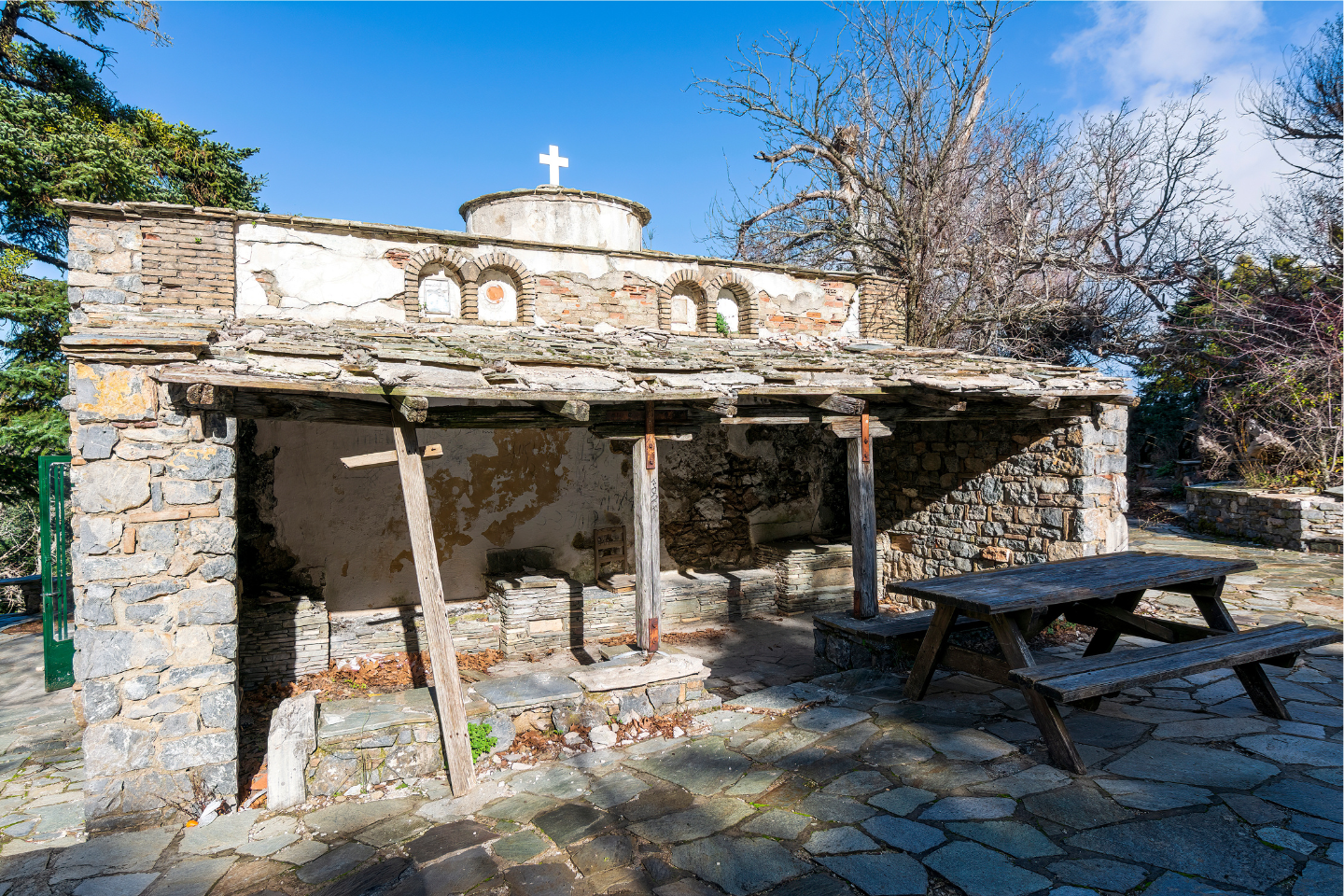 Small stone chapel and picnic area in Mount Parnitha National Park
