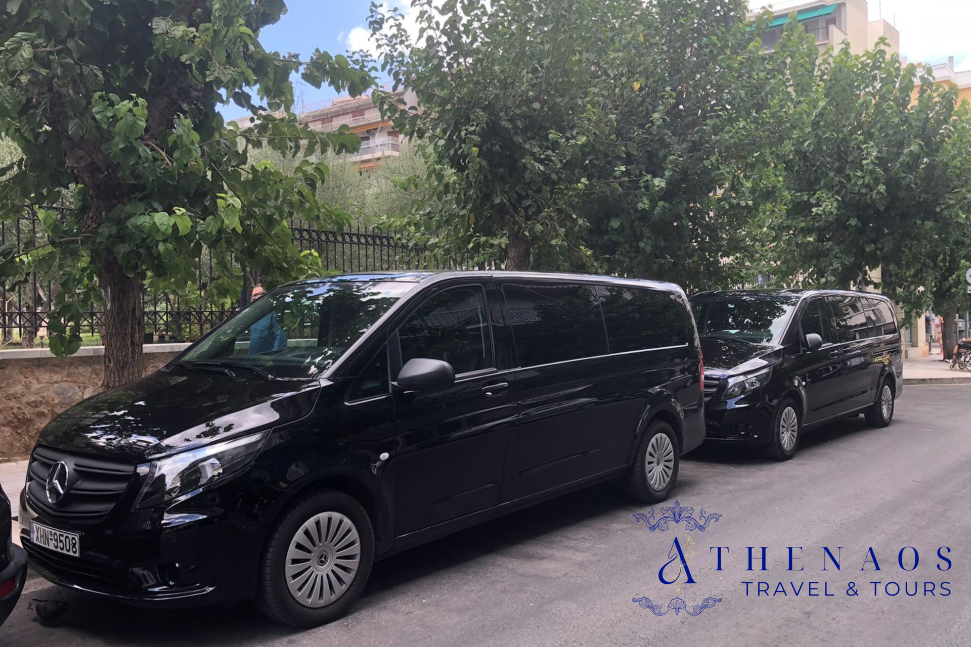Luxury black Mercedes-Benz vans used for private transfers by Athenaos Travel & Tours