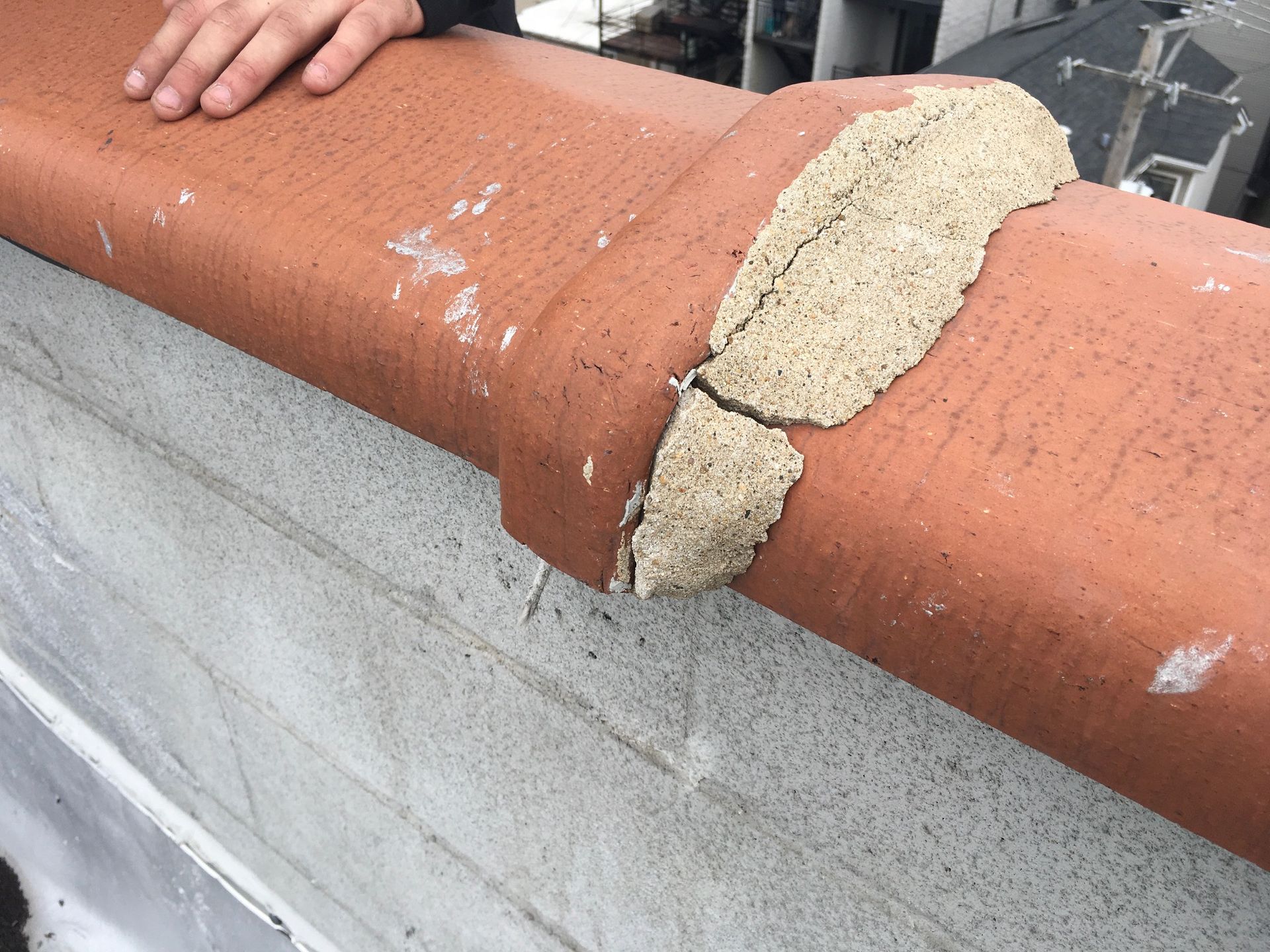 Clay Coping with failing mortar joint on bell in Edgewater, Chicago