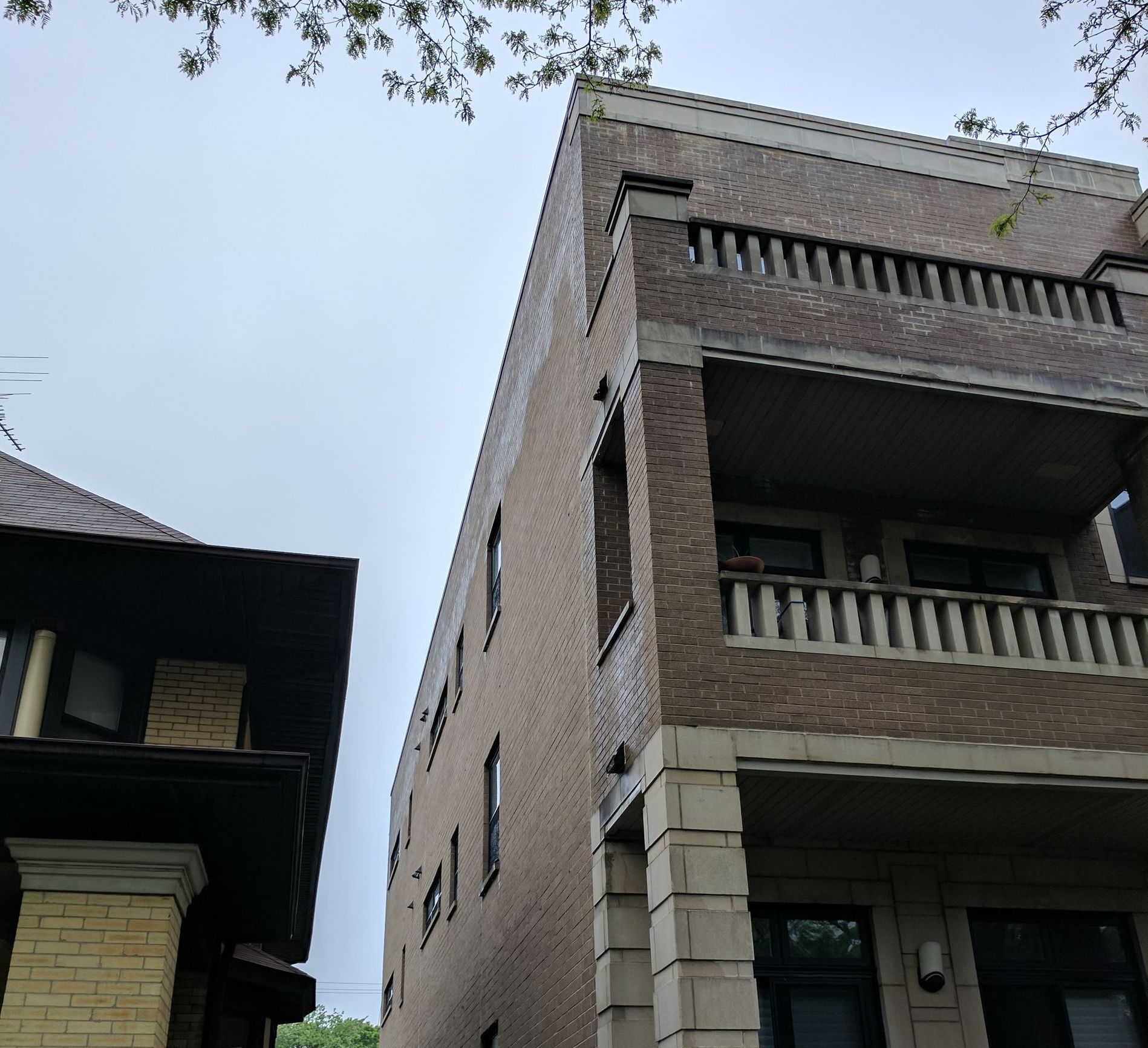 Water moves toward the top of the parapet after WickRight capstone vented drip edge is installed in Rogers Park, Chicago