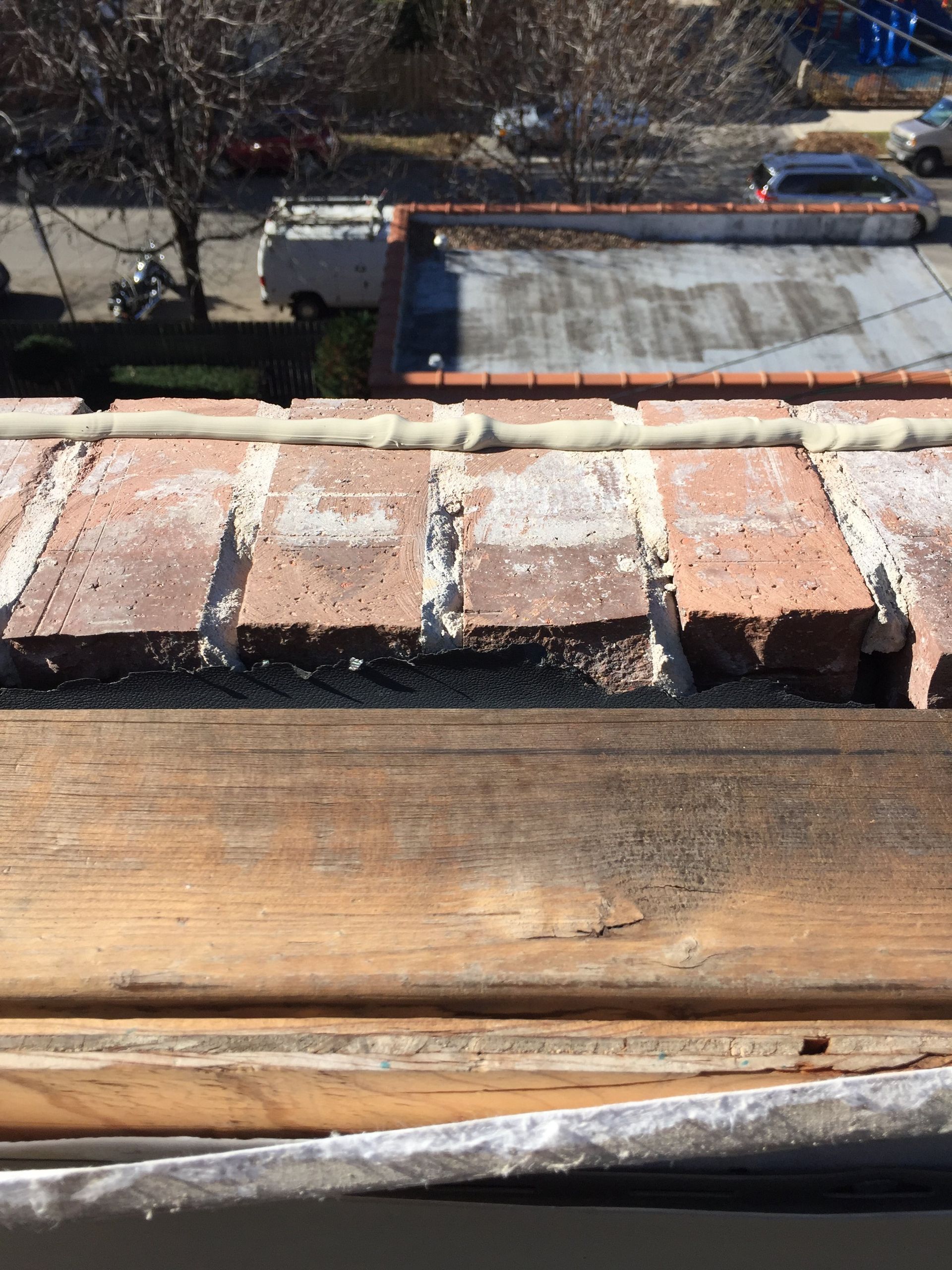 Brick and frame wall, frame wall show water damage