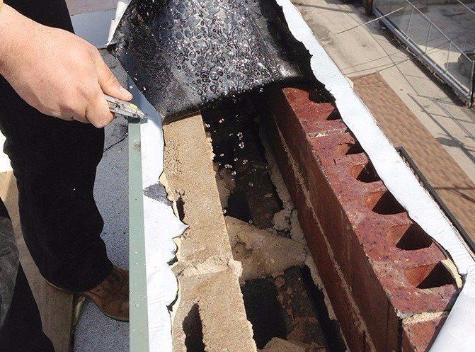 Condensation dripping into brick-block parapet wall