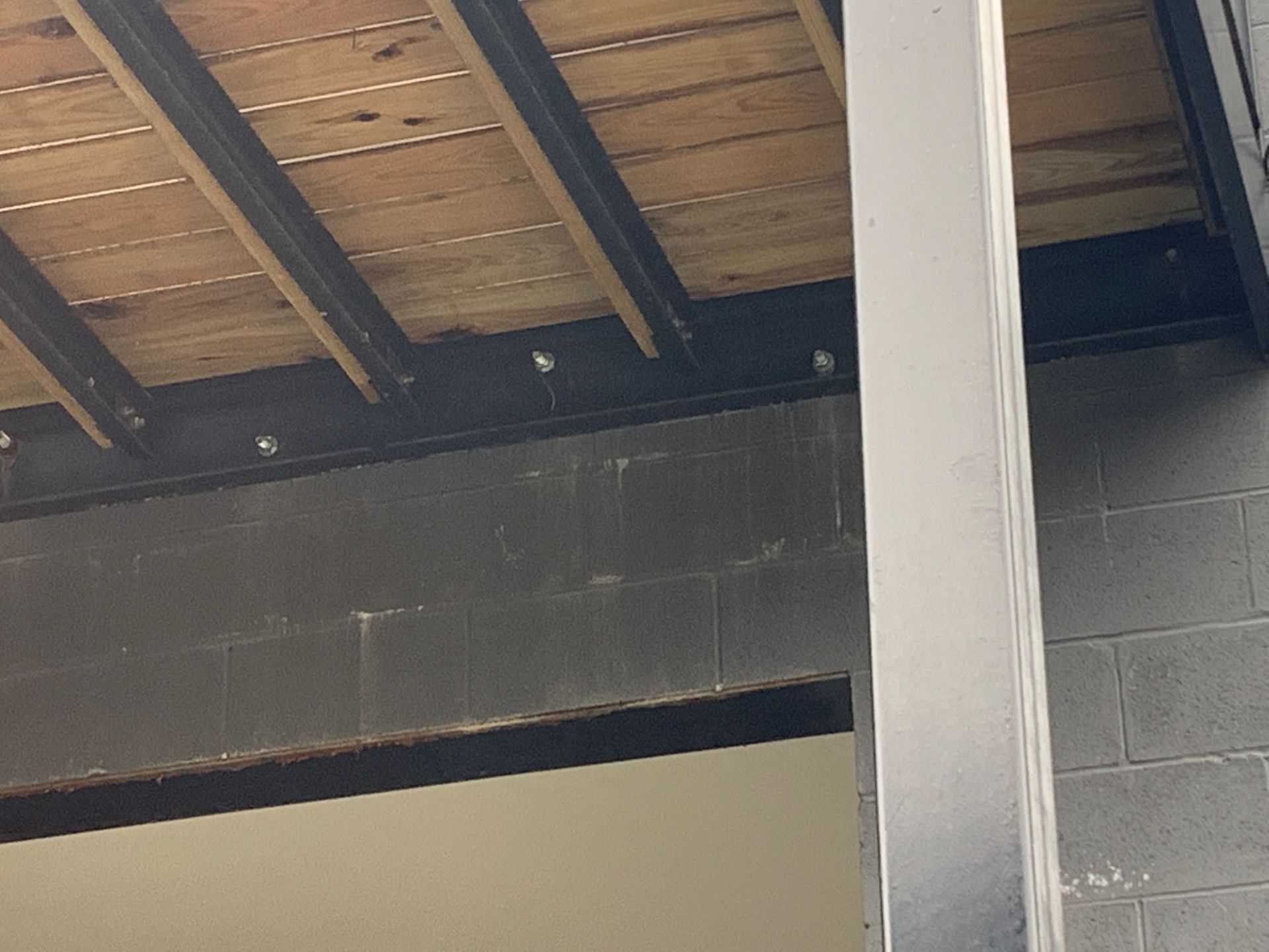 Leaking ledger board connections under balcony in Little Village, Chicago