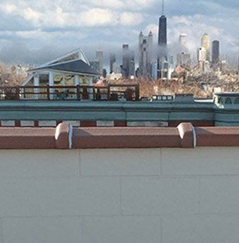 Great shot of Sears Tower etc shrouded in clouds from roof of WickRight clay coping vent installation, Chicago