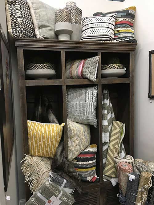 Beautiful Decor — Cabinet With Many Pillows in Wake Forest, NC