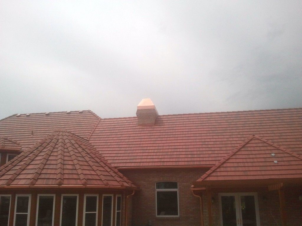 6 Inch Seamless Copper Half Round Gutter with Copper 4 Inch Round Downspout Broomfield Colorado